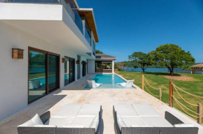 Beachfront Blue House at Paradise Reef